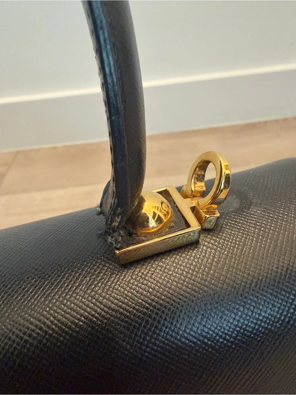 Vintage Salvatore Ferragamo Black Top-Handle Bag with Gold Gancini Closure